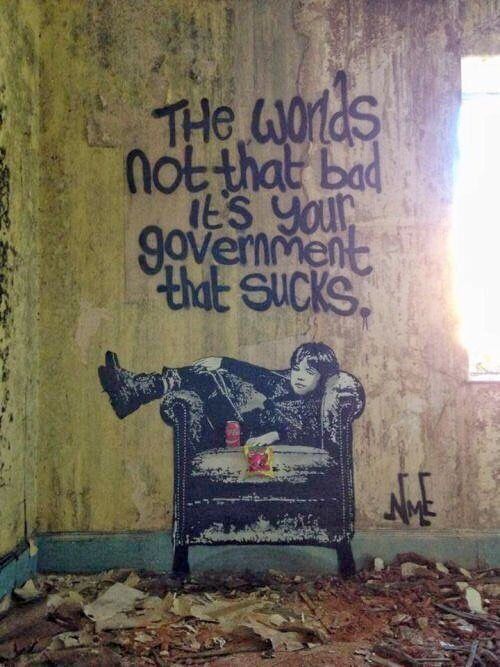 The words not that bad  it's your government that sucks,

graffiti of a kid lounging in an armchair