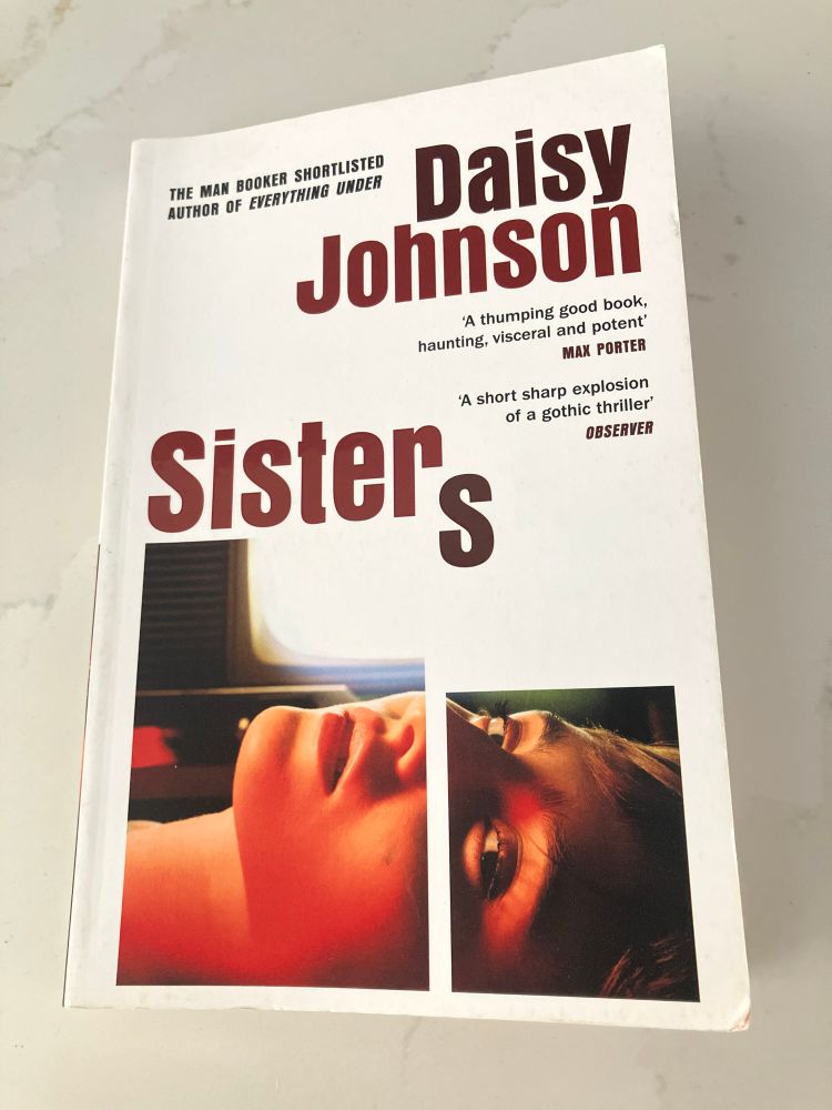 Front cover of a fiction book by Daisy Johnson called Sisters. 