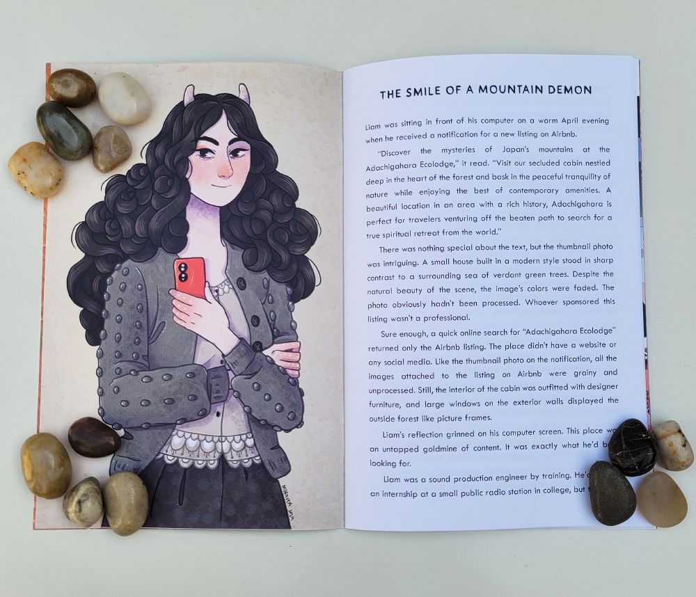 A photo of the interior pages of my short horror fiction zine Strange Tales and Modern Legends. The illustration was created by the artist Maxyvert.