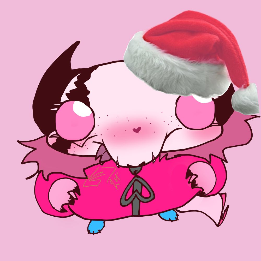 Eliza drawing in a Santa hat