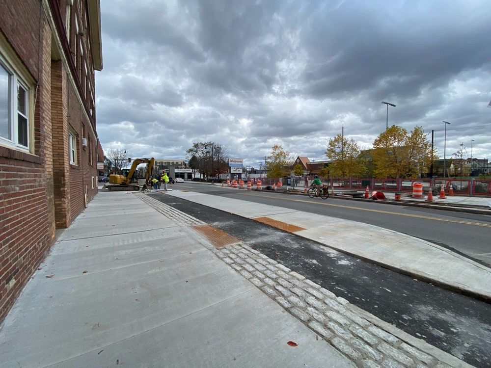 New cycle track at Somerville Ave and Central Street.