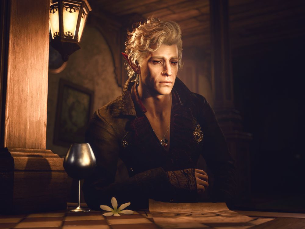 A screenshot of Aatarion from Baldur's Gate 3. He is sitting at a bar with his face illuminated by a nearby hanging lantern. He leans his right arm on the bar, looking sadly into the distance. A wine glass, a flower and a piece of paper sit on the bar in front of him. He is wearing a dark jacket and frilled red shirt.