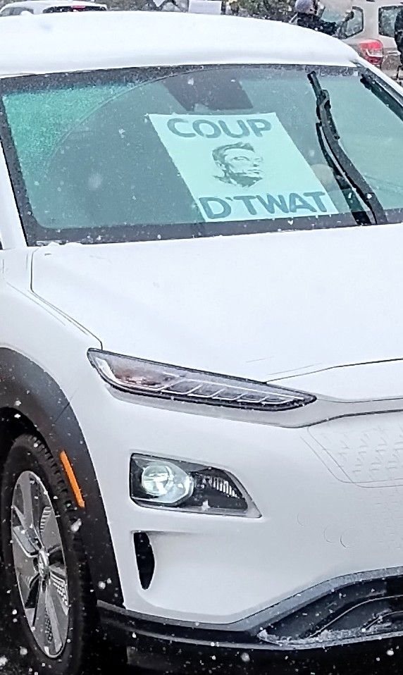 Protest sign:: Coup D-Twat