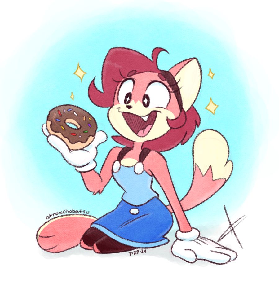 Sarah looking very pleased with a chocolate sprinkled donut. One of her favorites!