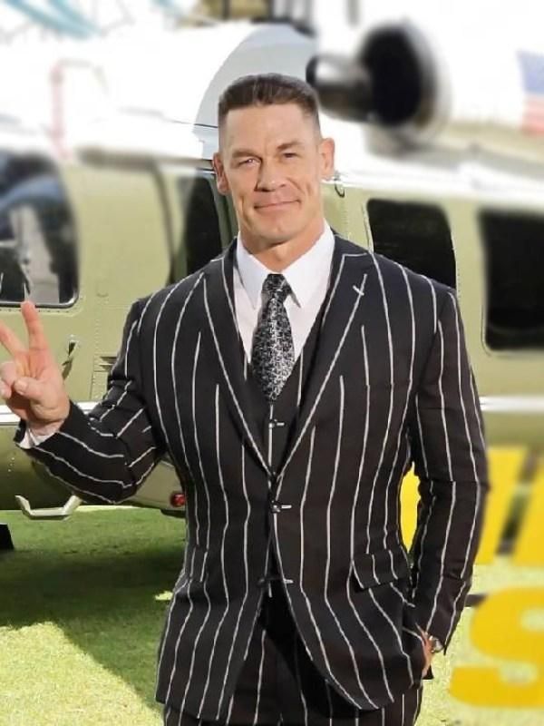 Cena in one of his many pinstripe suits