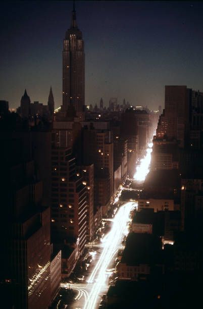 Another line of light on a street from car headlights.
