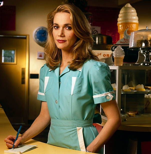 Lipton as Norma Jennings, wearing a light blue uniform behind the counter of Twin Peaks' Double R Diner.