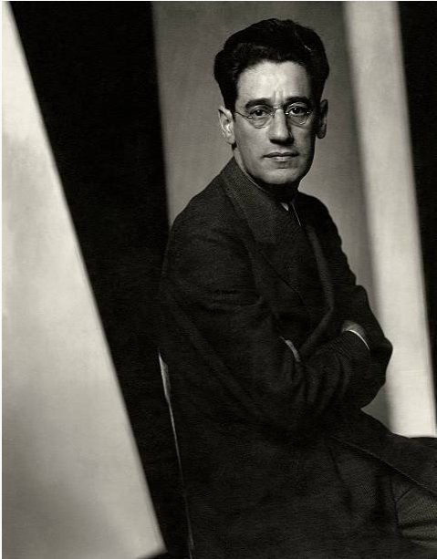 Kaufman poses with his arms crossed.