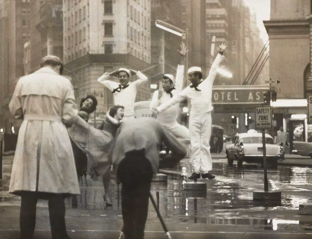 Parks photographs the dancers in Times Square.