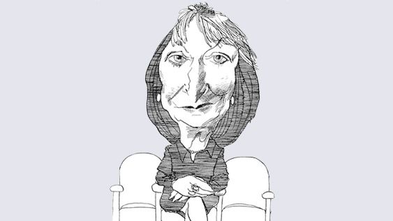 Caricature of Kael sitting in a movie theatre.