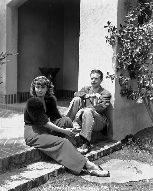 Blondell & Powell sitting on their front porch
