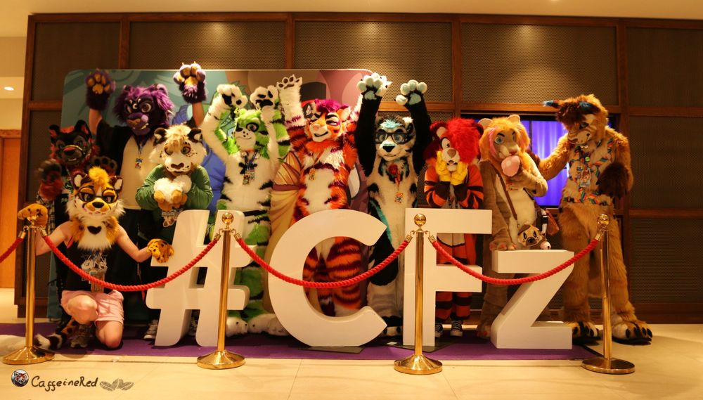 Photo of a group of big cat fursuitters 
