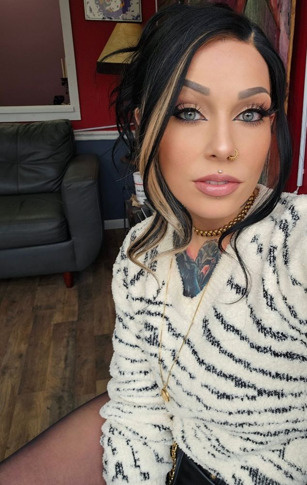 Alt girl selfie with fuzzy sweater 