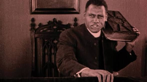 Paul Robeson as a conning preacher in 1925 film Body and Soul.