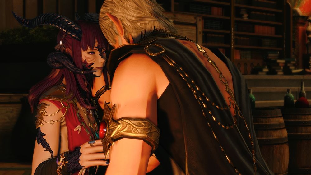 Same pose as previous post's imageset, except it is zoomed out and you can more clearly see their surroundings, the clutter at the Bookman's Shelves. Urianger's back is visible, the chains of his robes glinting in the lamplight.