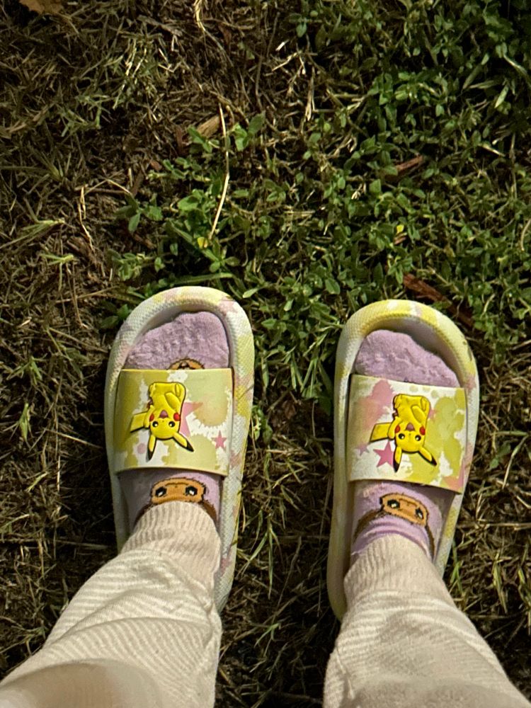 lohla wearing eevee socks and pikachu slides