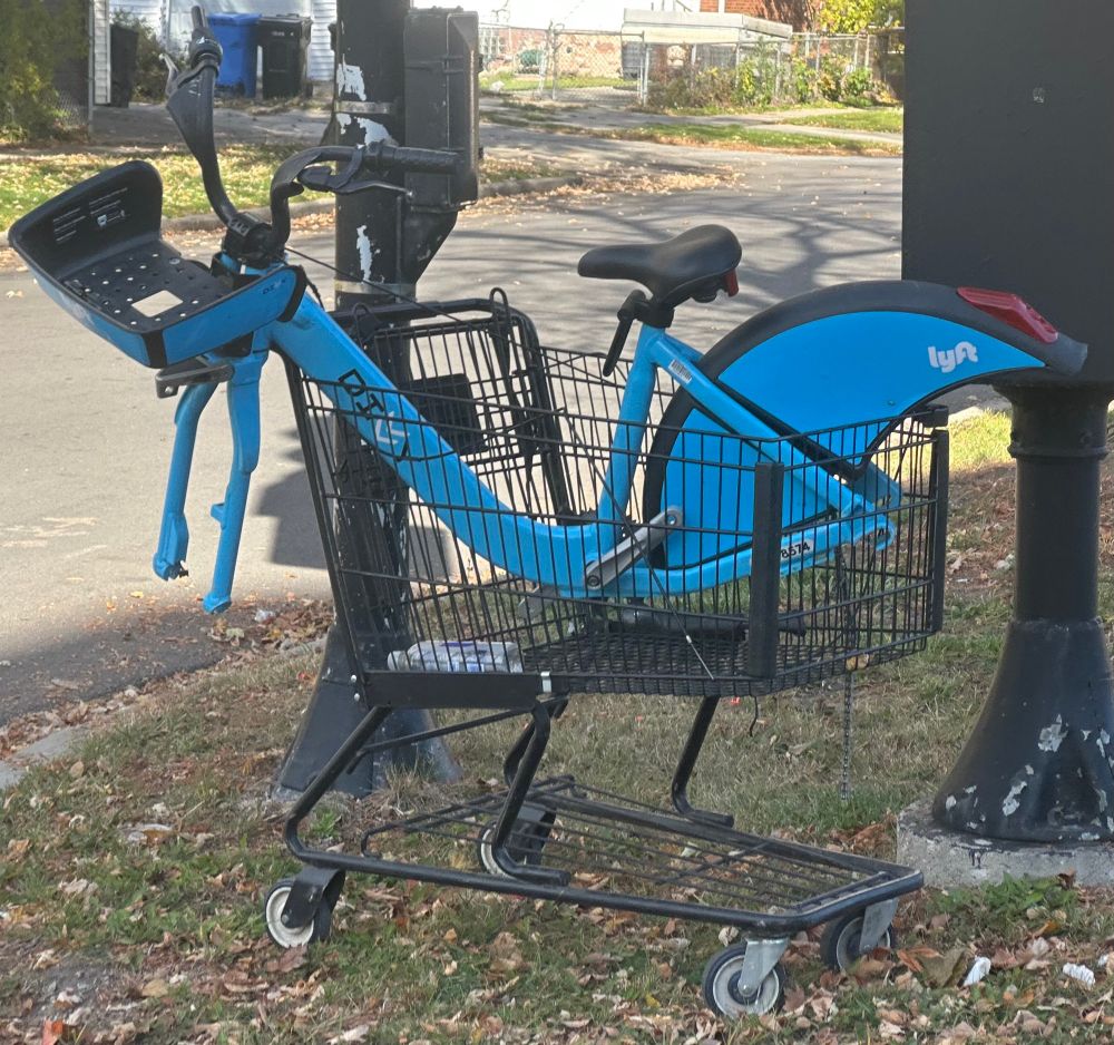 Lyft bike inside of shopping cart