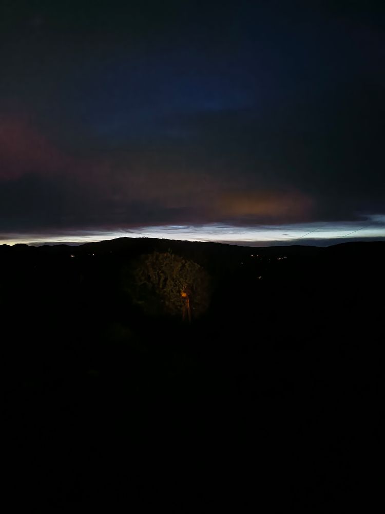 A silvery sliver of dawn between earth and clouds.











































searching for you between layers 