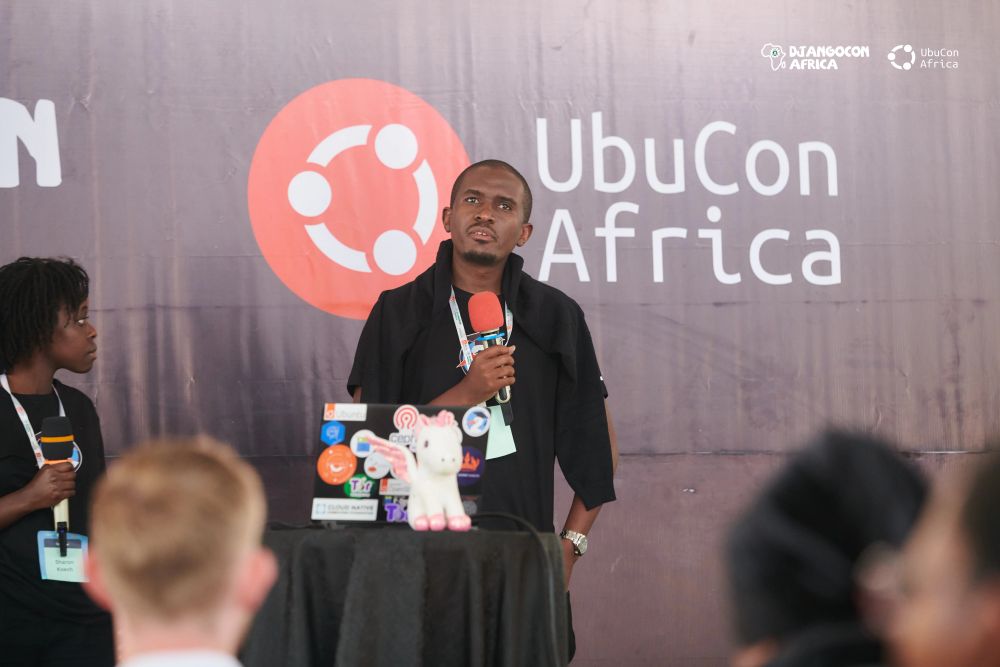Geoffrey Nyaga & Sharon Koech at #DjangoConAfrica2025 + #UbuConAfrica on: "Open the door to open-source; welcome to the Open Documentation Academy"