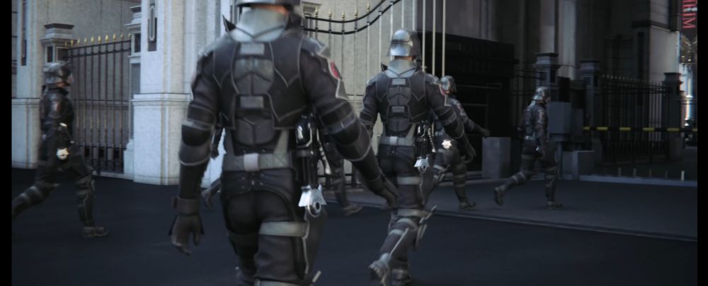 Crownsguard members march through the arches surrounding the citadel itself. They have a boxy device on their hips with a sort of round thing at the bottom which might be a hinge or decoration.