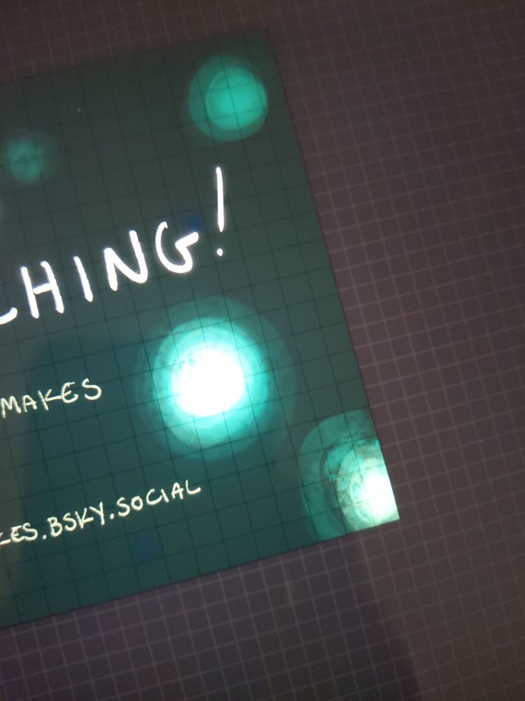 Photograph of part of an iPad screen. Procreate is open and part of a video end card is visible. End image ID.