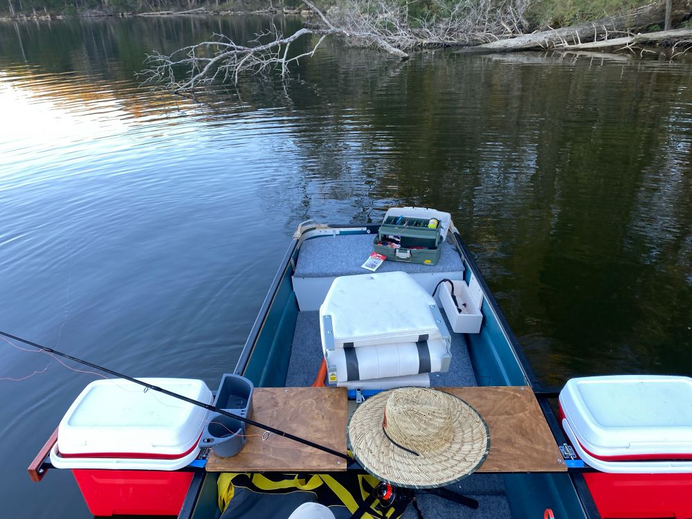 Coleman crawdad boat on a lake