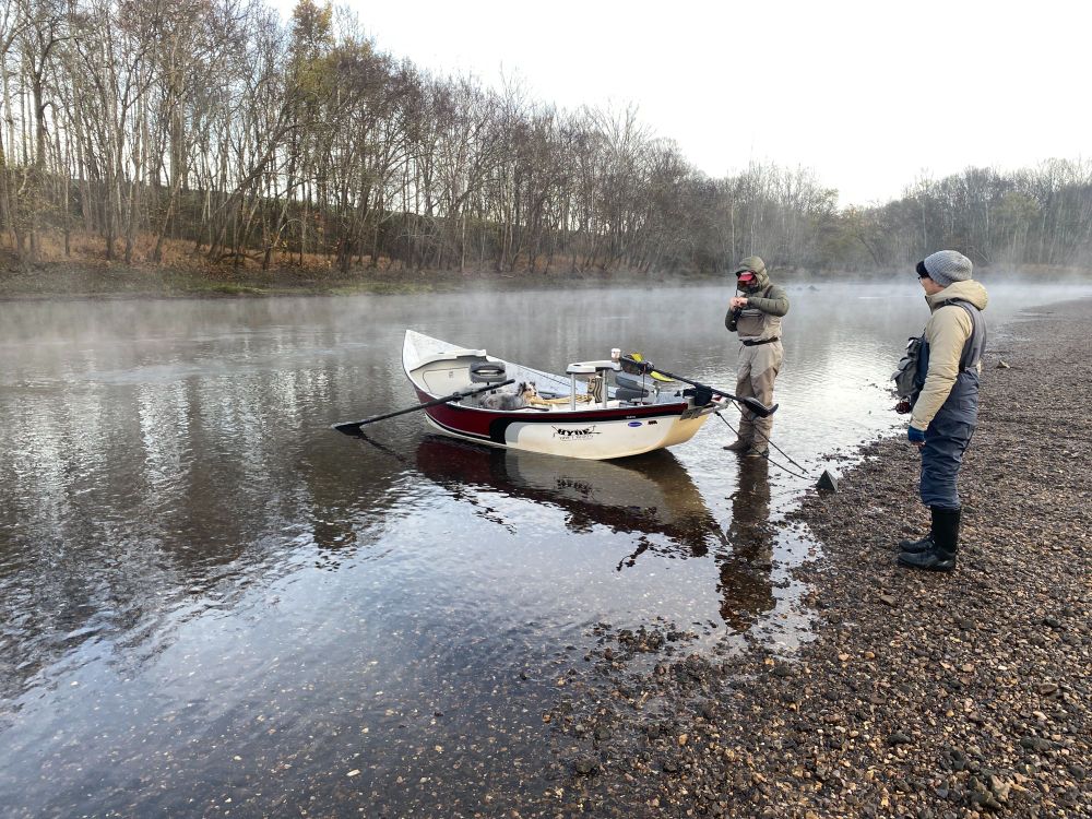 Men about to get into a drift boat