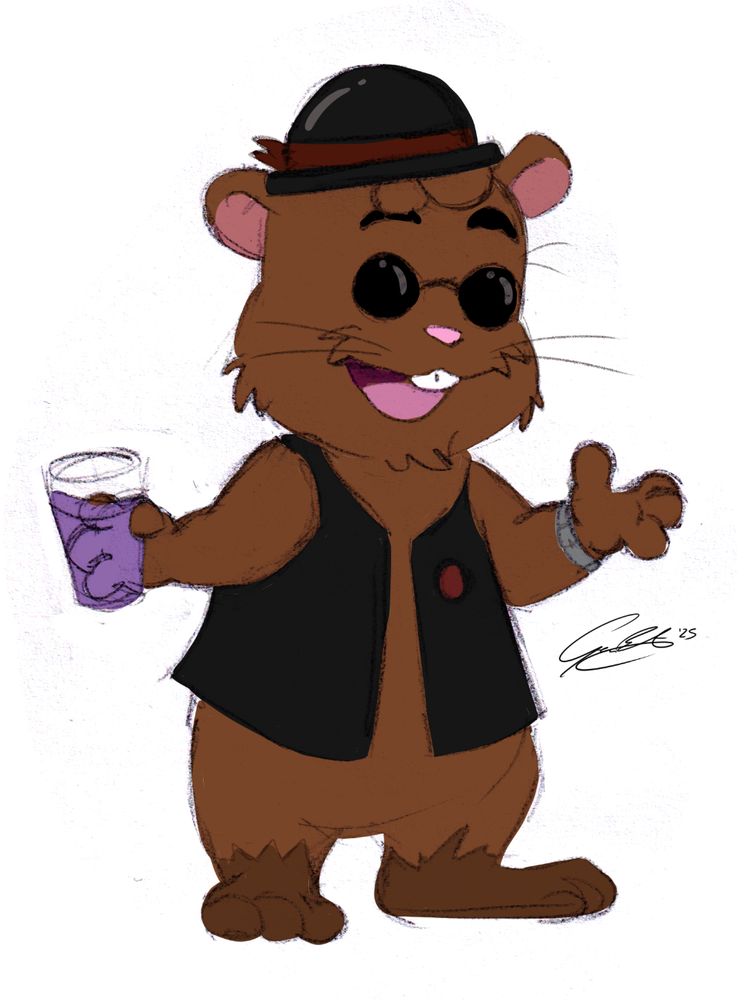 Bobby Javalham standing and chatting while holding a glass of purple juice. Perhaps it is blackcurrant.
