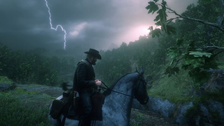 Arthur Morgan wearing his hat and on a horse, in a foresty landscape as a thunderbolt cracks across the sky above