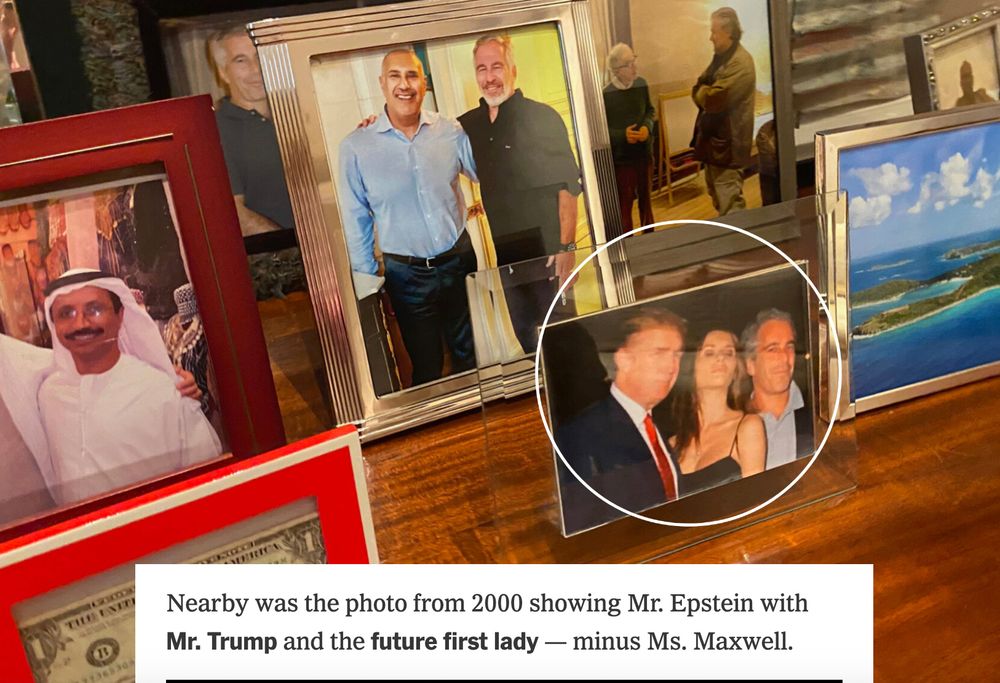 A photo from the NYT of several framed photographs on a table in Jeffrey Epstein's NY mansion. Highlighted is a picture of Trump, Melania and Epstein posing together and looking sweaty. It's the photo you usually see of the four of them, but Ghislaine is cropped out. Behind that is a framed photo featuring Steve Bannon in his grubby Barbour jacket. 