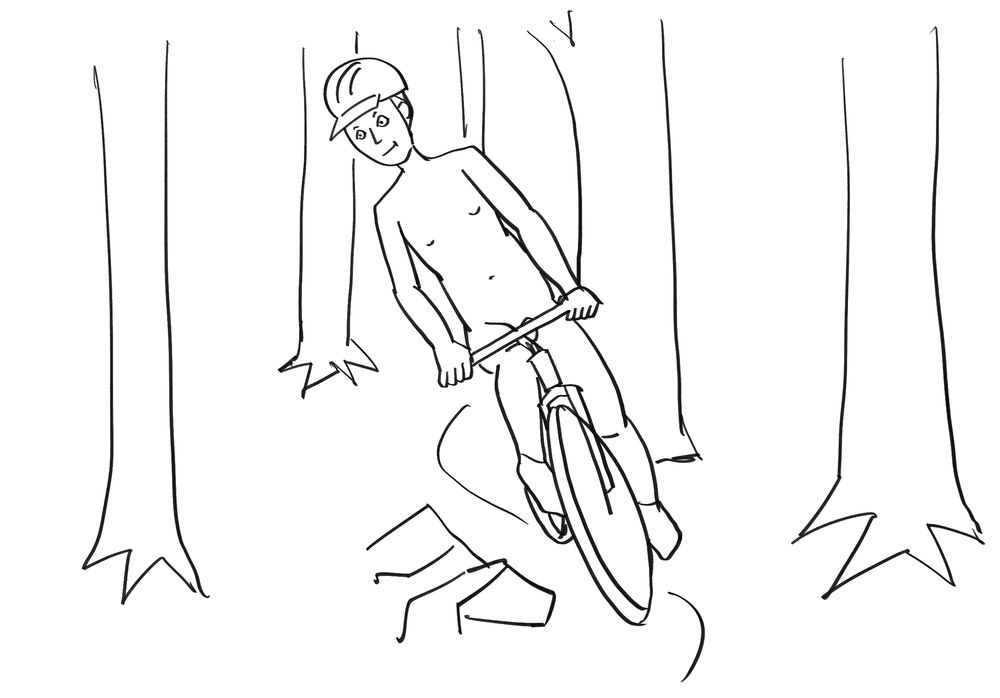 Bryan is weaving his mountain bike down some smooth single-track. Yeah, he’s naked except his helmet and shoes. 