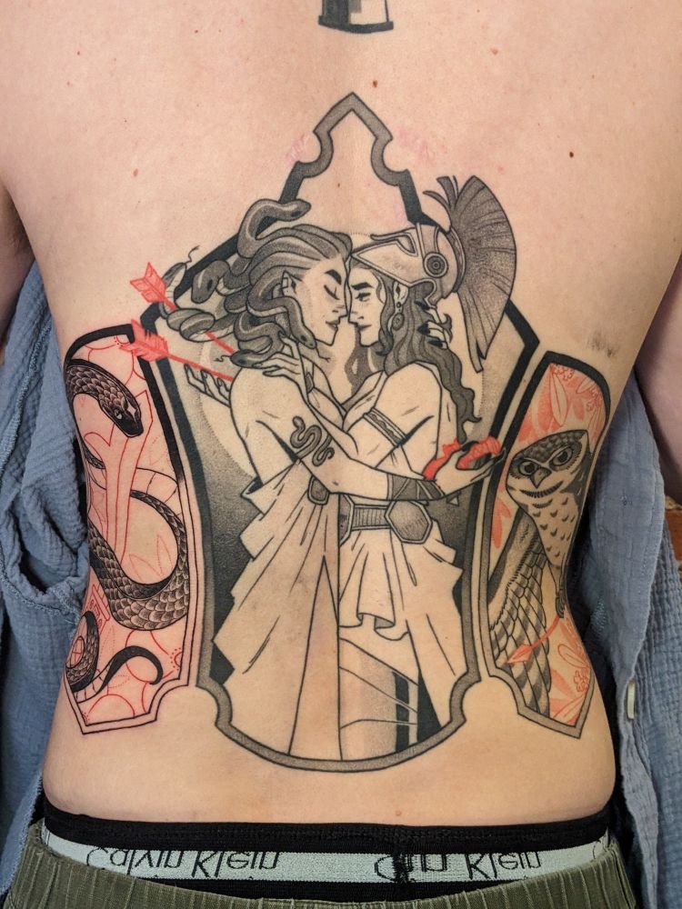 In context, a three panel backpiece of a snake and sword (panel 1), medusa and Athena embracing (panel 2), and then an owl holding an arrow (panel 3)