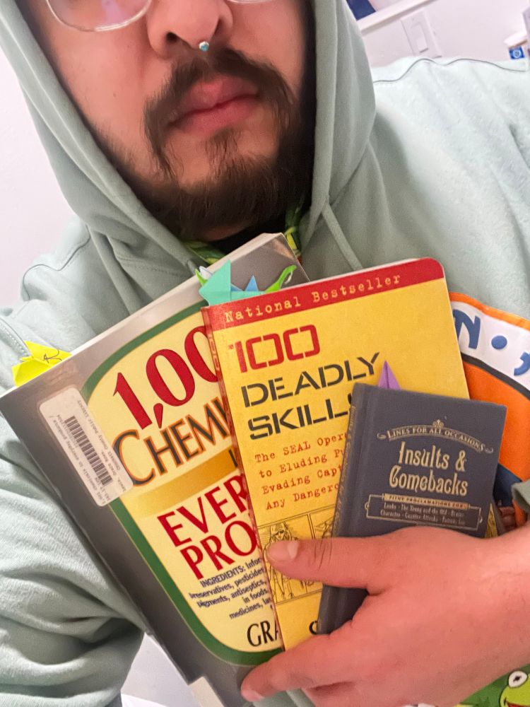 Showing off 3 reference style books that contain sensitive knowledge. The first book is “Insults & Comebacks”, the second book is “100 Deadly Skills”, and the third book is “1,001 Chemicals in Everyday Products”. 