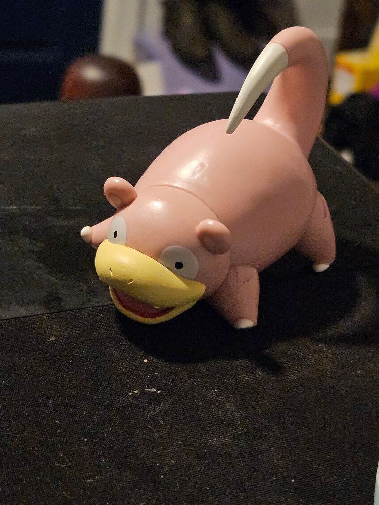 Slowpoke sits there, wondering where her almond went.