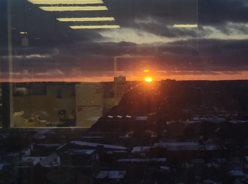 Photo of a sunset from the kitchen window in the retina lab at Dalhousie.
