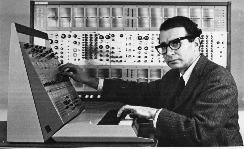Portrait of Alan R Pearlman with an ARP 2600 and ARP 2500 