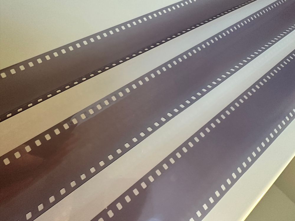 3 rolls of developed 35mm film which had been through the CT scanner at Manchester Airport, UK. The film strips have developed blank. There is a small chance this is developer error, but unlikely. 