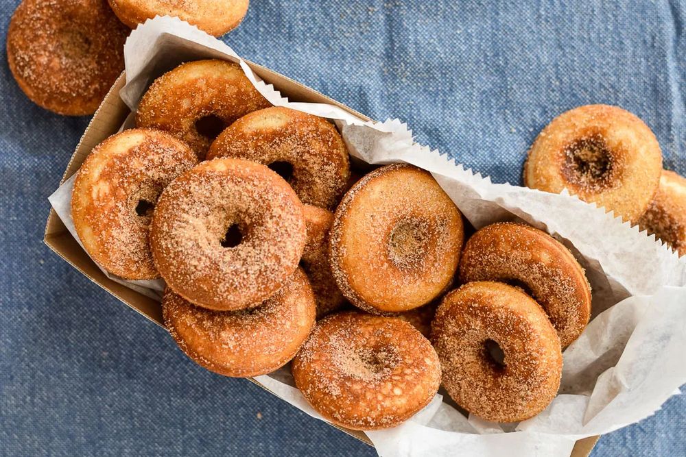 hot mini donuts with cinnamon sugar dusting.