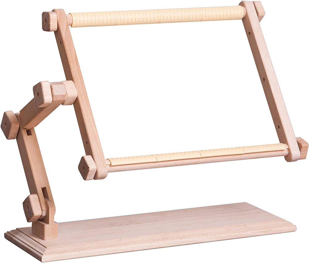 A square table top embroidery frame with movable arm.