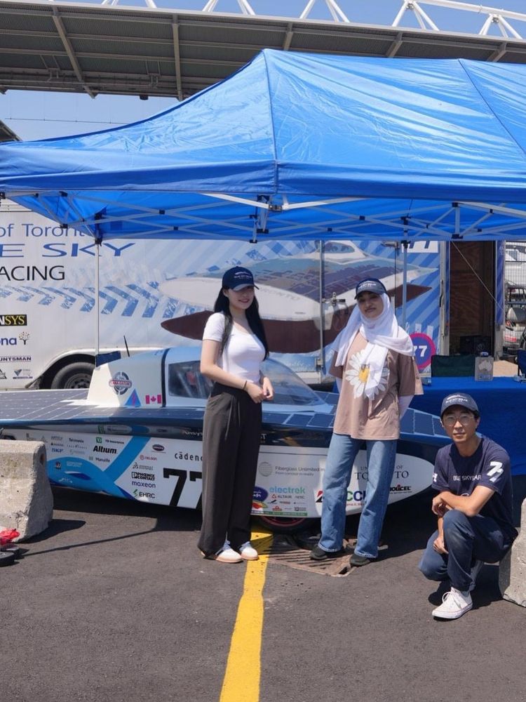 Student team showcasing Blue Sky Solar vehicle