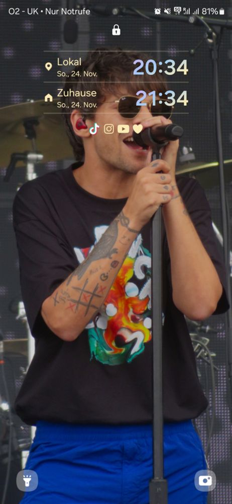My Lockscreen showing Louis Tomlinson at Pinkpop Festival
