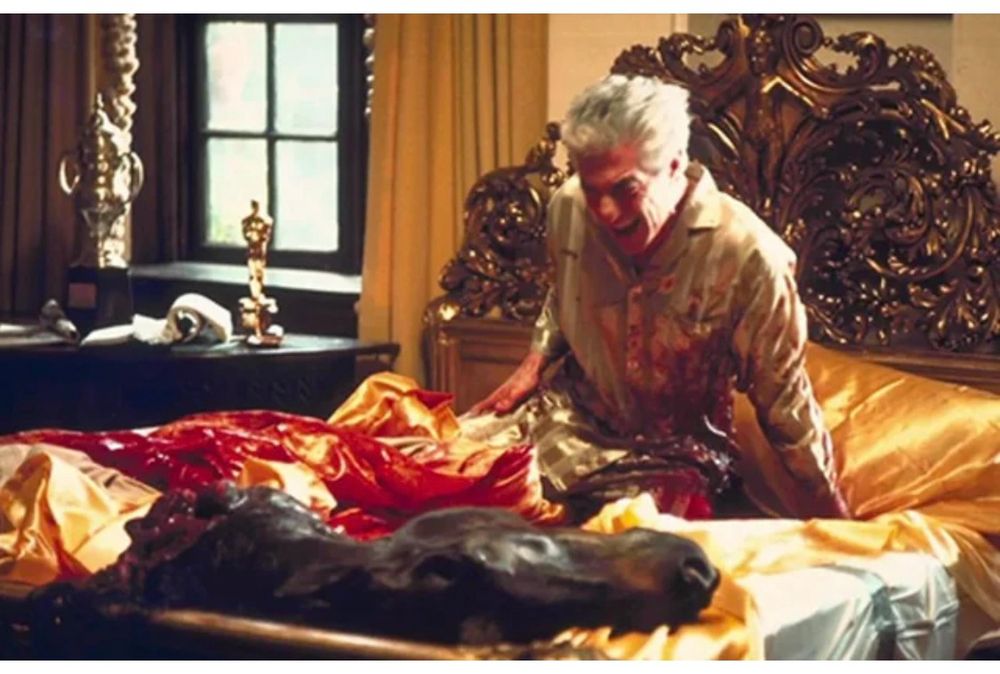 Scene from The Godfather horse head in bed warning 