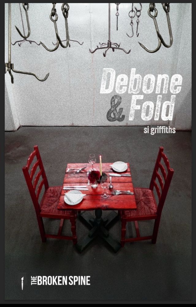 Debone & fold poetry book cover by Si Griffiths. A red dining table and 2 chairs, the table laid ready for diner 