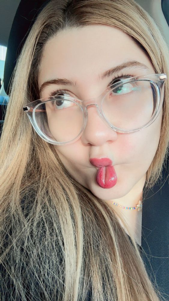 me making a silly face wearing my glasses 
