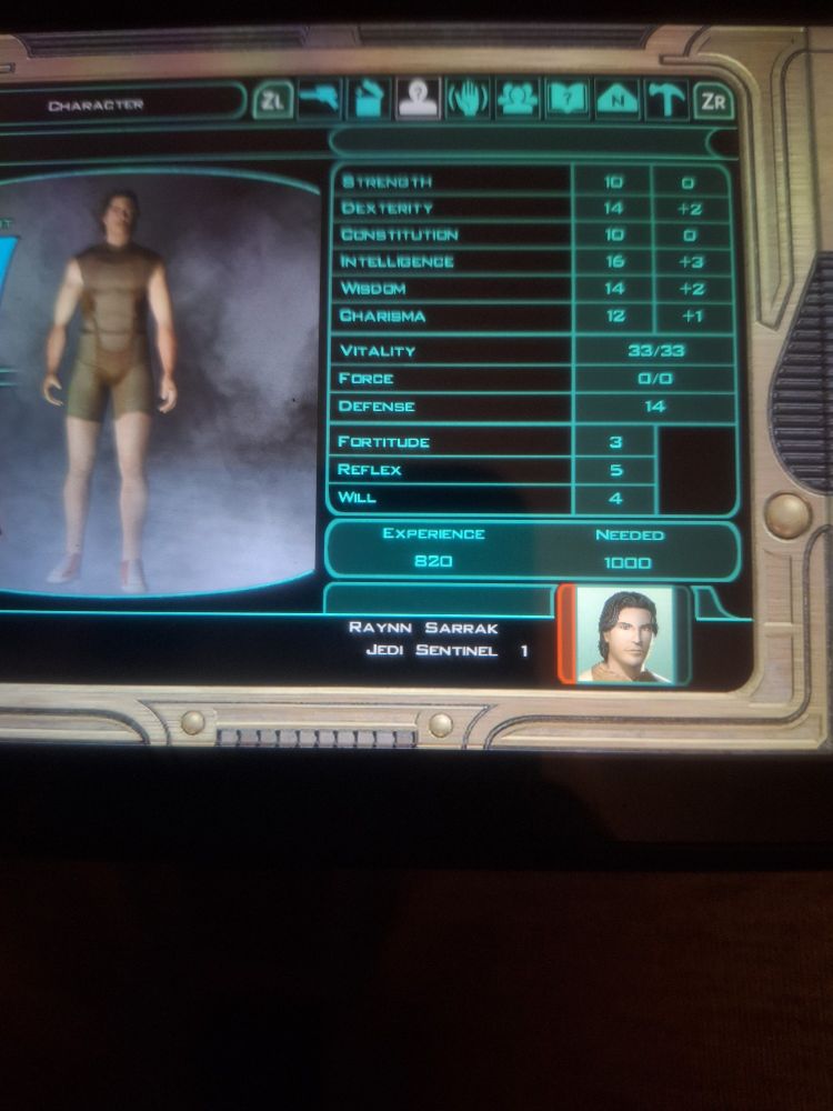 A kind of shitty phone pic of a nintendo switch screen, showing the player character in Star Wars: Knights of the Old Republic 2, named Raynn Sarrak