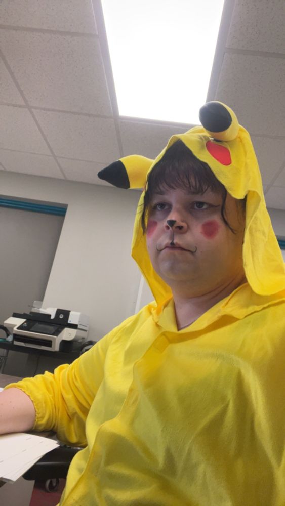User in a pikachu costume.