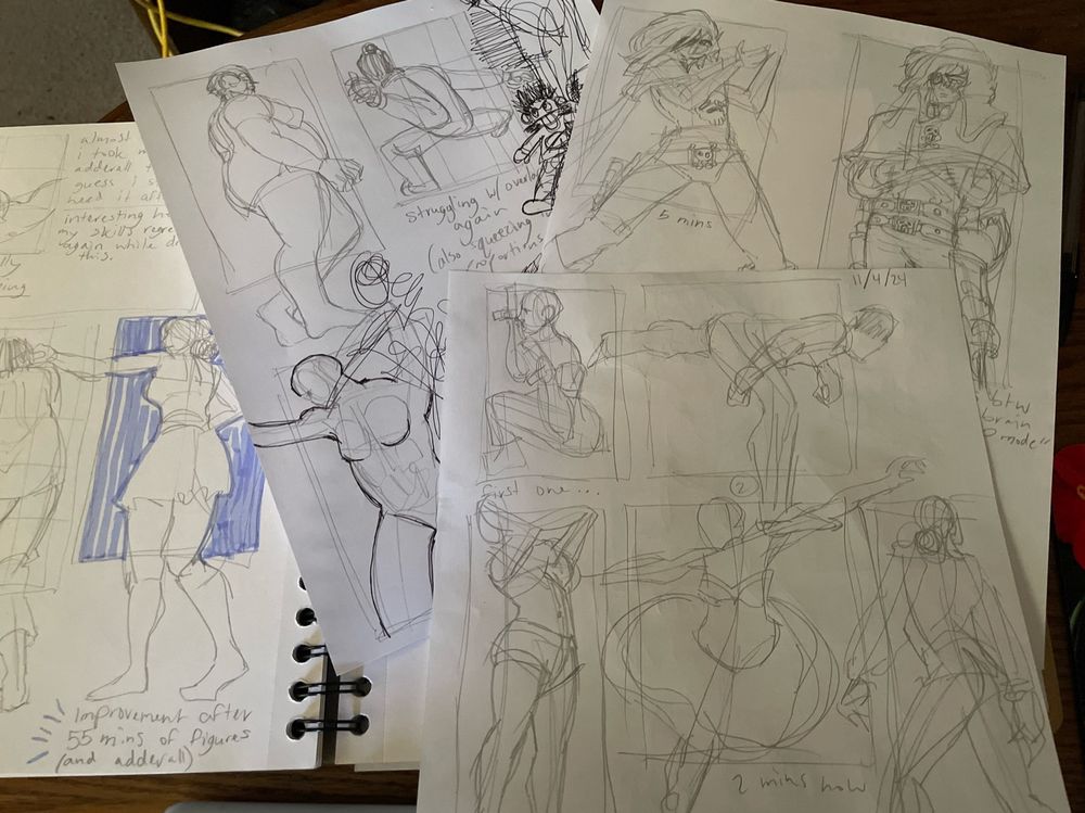 piles of various drawing pages of poses, scribbles, and the fictional character captain harlock