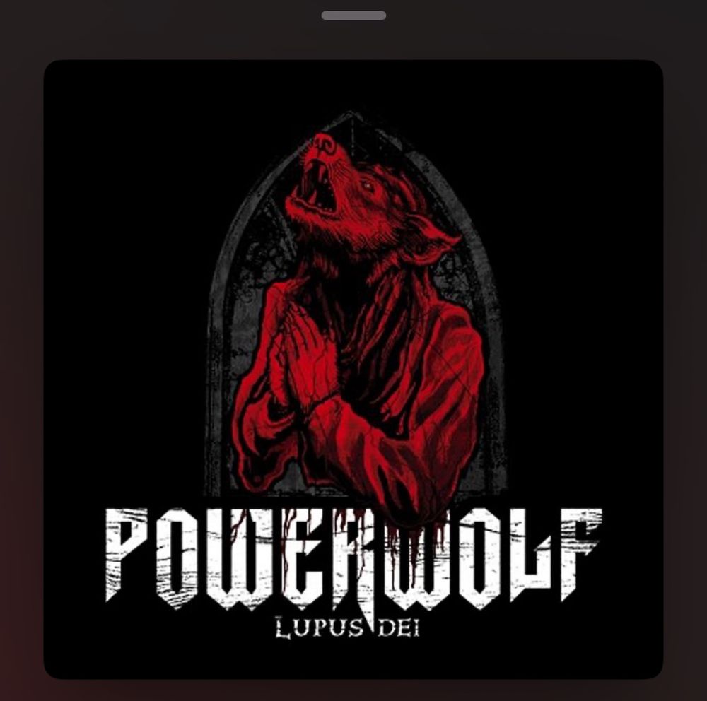 Album cover of Powerwolf’s 2007 album Lupus Dei. Art is a red werewolf praying to heaven. The artist is Zsofia Dankova 
