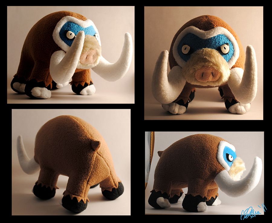 Mamoswine plushie seen from a few different angles. The eyes are sculpted and painted. I was very pleased with the snout; how all the fabrics came together perfectly and the little bit of thread sculpting in the nostrils really brought out the dimension of the nose. I remember being somewhat unhappy with the feet fuzz, because I have a general distaste for leaving raw edges showing. But it worked well here.