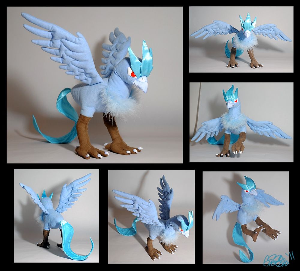 An Articuno plushie photographed at several different angles. The main body and legs are suede, while the head and tail feathers are blue satin to give them some luster. The chest has a real feather ruff. The eyes, beak, and claws are sculpted and painted. Wire runs through all the limbs and the tail for maximum posing. I still remember some of the techniques I learned from making this birdy, like how to achieve a flat object that has wires running through it. 